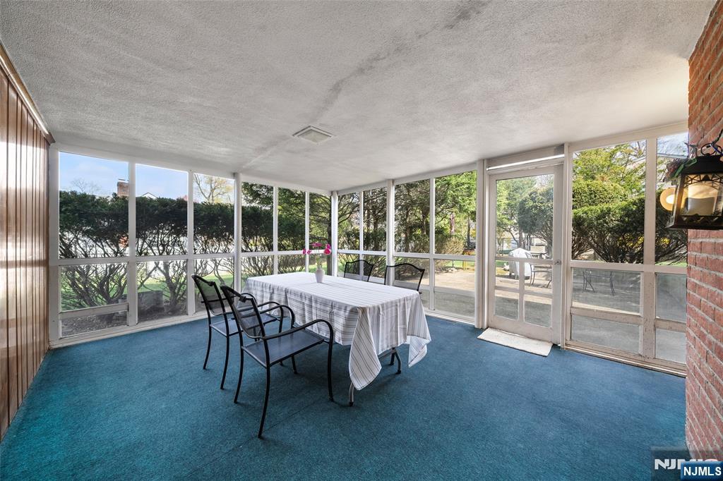 970 Soldier Hill Road Emerson, NJ 07630 - Photo 30 of 37 a view of a dining room with furniture window and outside view