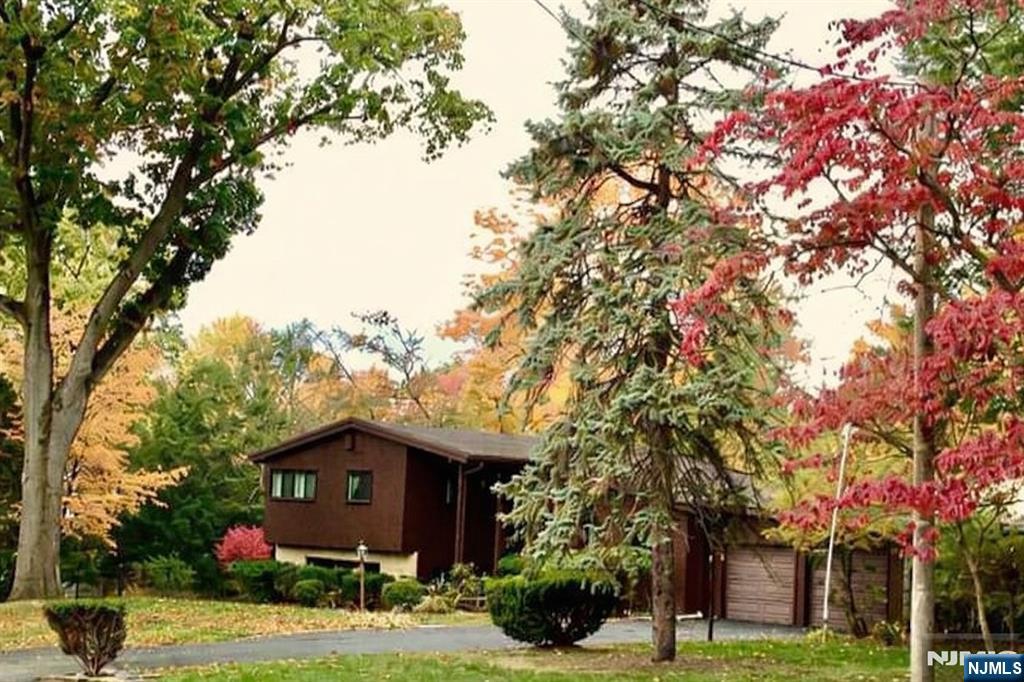 970 Soldier Hill Road Emerson, NJ 07630 - Photo 36 of 37 a view of a house with a yard