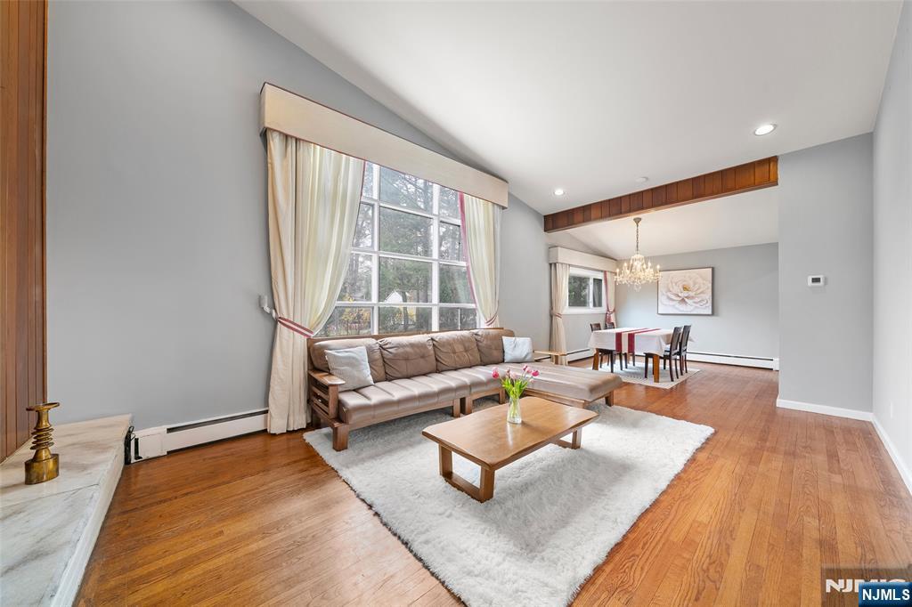 970 Soldier Hill Road Emerson, NJ 07630 - Photo 7 of 37 a living room with furniture and a table