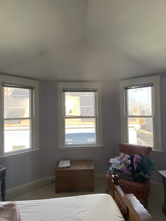 16 Fairfield Street, Unit 3 Cambridge, MA 02140 - Photo 5 of 6 a bedroom with a bed and windows