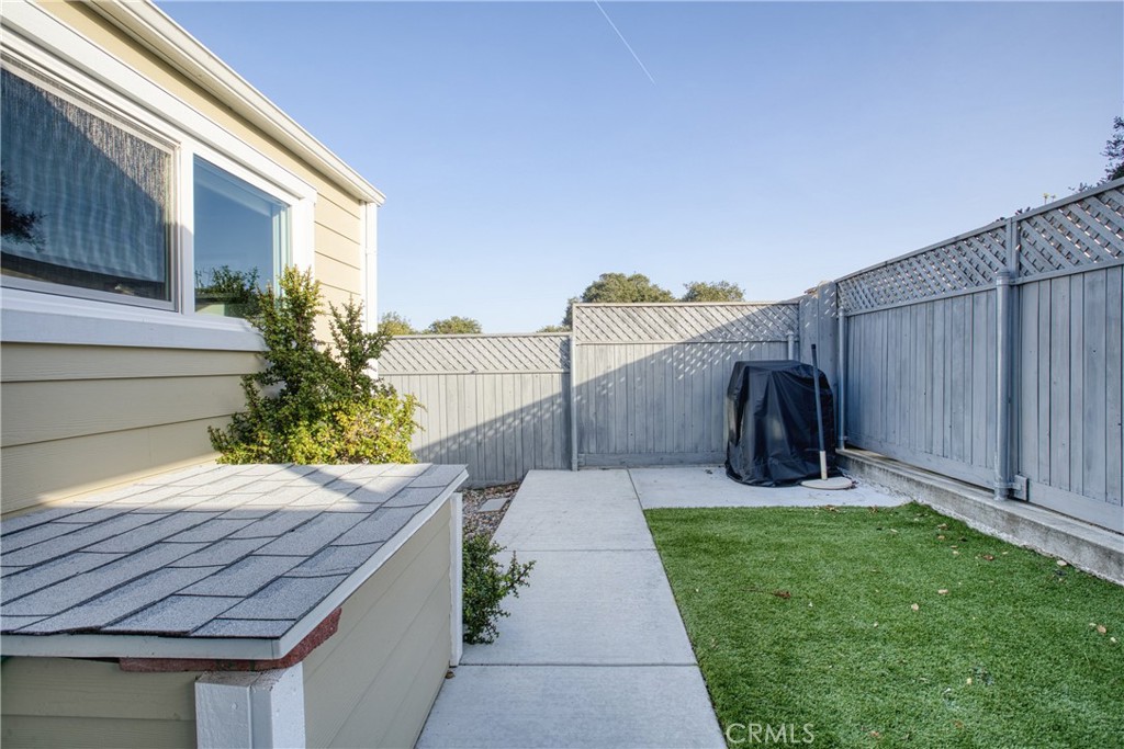 1595 Los Osos Valley Road, Unit 11A Los Osos, CA 93402 - Photo 13 of 31 a view of a backyard with sitting area