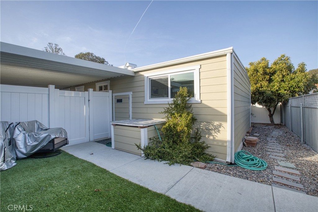 1595 Los Osos Valley Road, Unit 11A Los Osos, CA 93402 - Photo 14 of 31 a front view of a house with garden