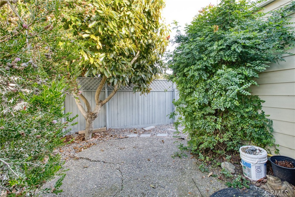 1595 Los Osos Valley Road, Unit 11A Los Osos, CA 93402 - Photo 15 of 31 a view of a backyard of the house