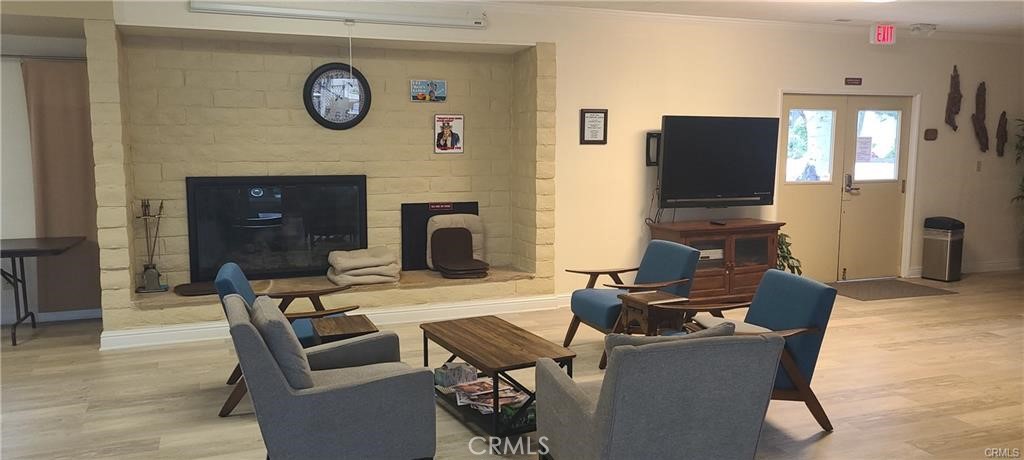 1595 Los Osos Valley Road, Unit 11A Los Osos, CA 93402 - Photo 21 of 31 a living room with furniture and a fireplace