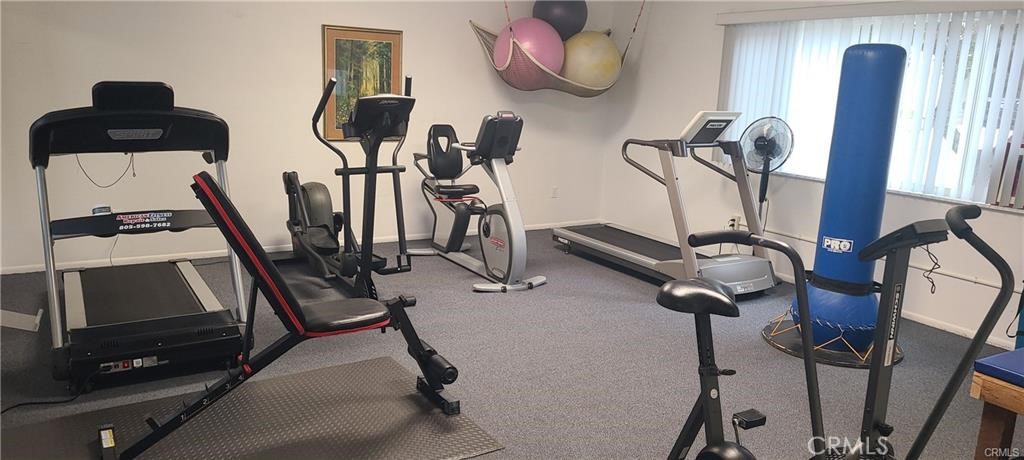 1595 Los Osos Valley Road, Unit 11A Los Osos, CA 93402 - Photo 22 of 31 a view of a room with gym equipment