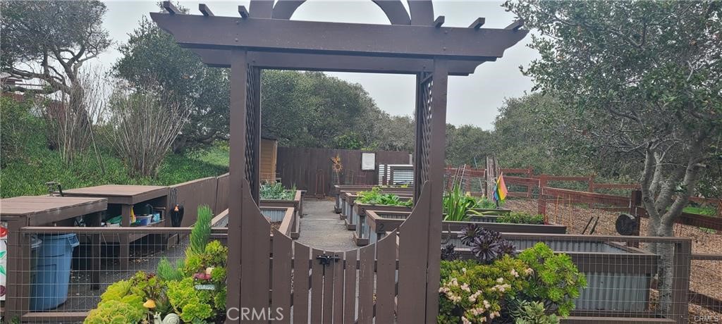 1595 Los Osos Valley Road, Unit 11A Los Osos, CA 93402 - Photo 23 of 31 a view of yard from deck having patio