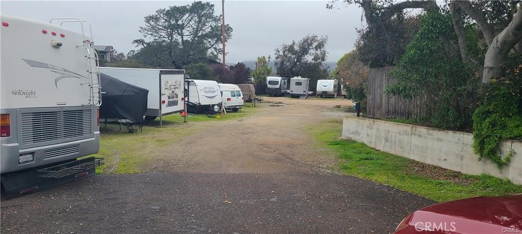 1595 Los Osos Valley Road, Unit 11A Los Osos, CA 93402 - Photo 26 of 31 a view of a backyard with trees