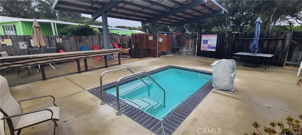1595 Los Osos Valley Road, Unit 11A Los Osos, CA 93402 - Photo 27 of 31 a living room with a couch