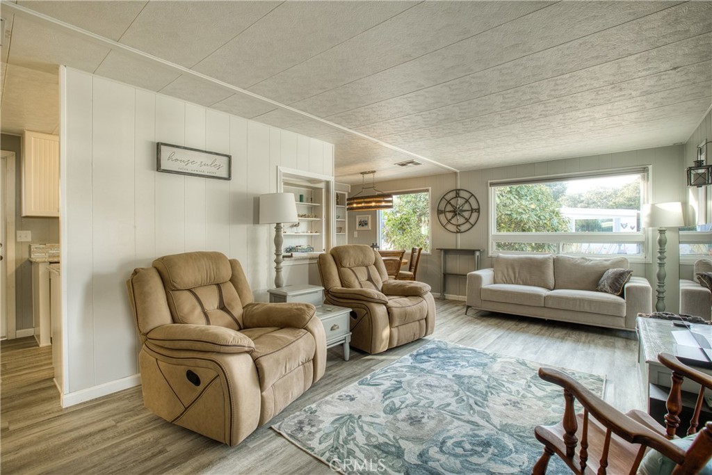 1595 Los Osos Valley Road, Unit 11A Los Osos, CA 93402 - Photo 4 of 31 a living room with furniture and a large window