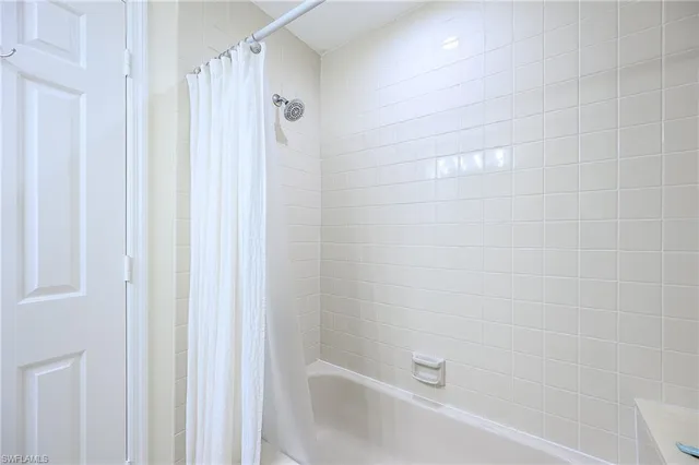 a view of a house with swimming pool and sitting area