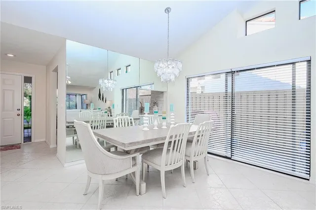 a living room with furniture rug and window