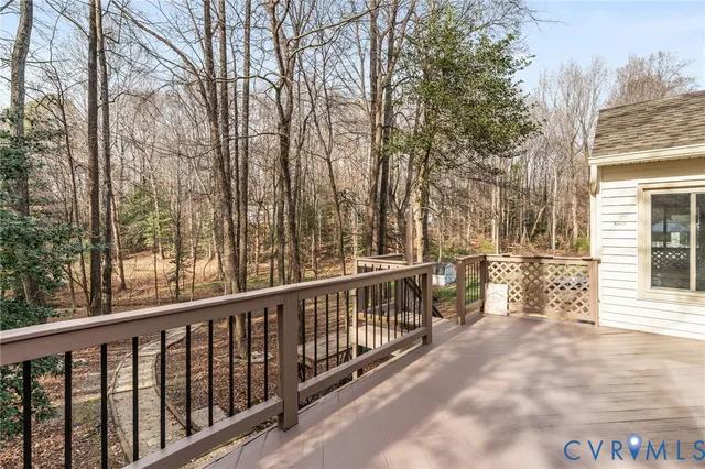 a view of a balcony with trees