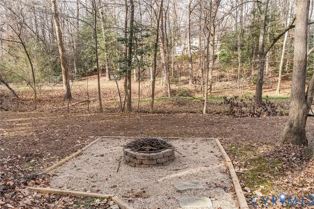 a view of a backyard of the house