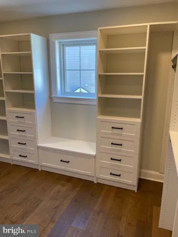 a view of an empty room with empty racks