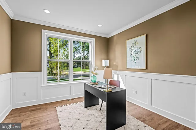 a living room with furniture and window