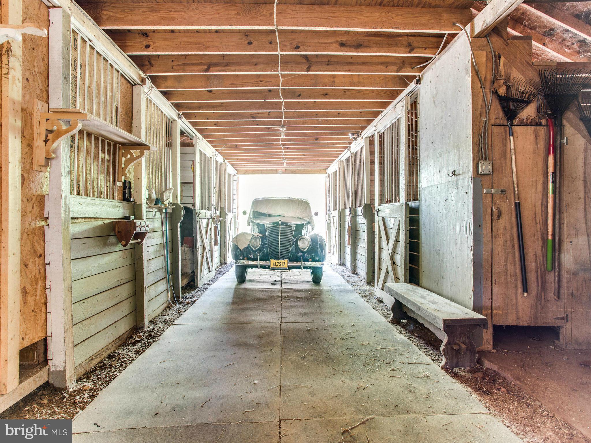23473 Potts Mill Road Middleburg, VA 20117 - Photo 28 of 30 CENTER AISLE BARN