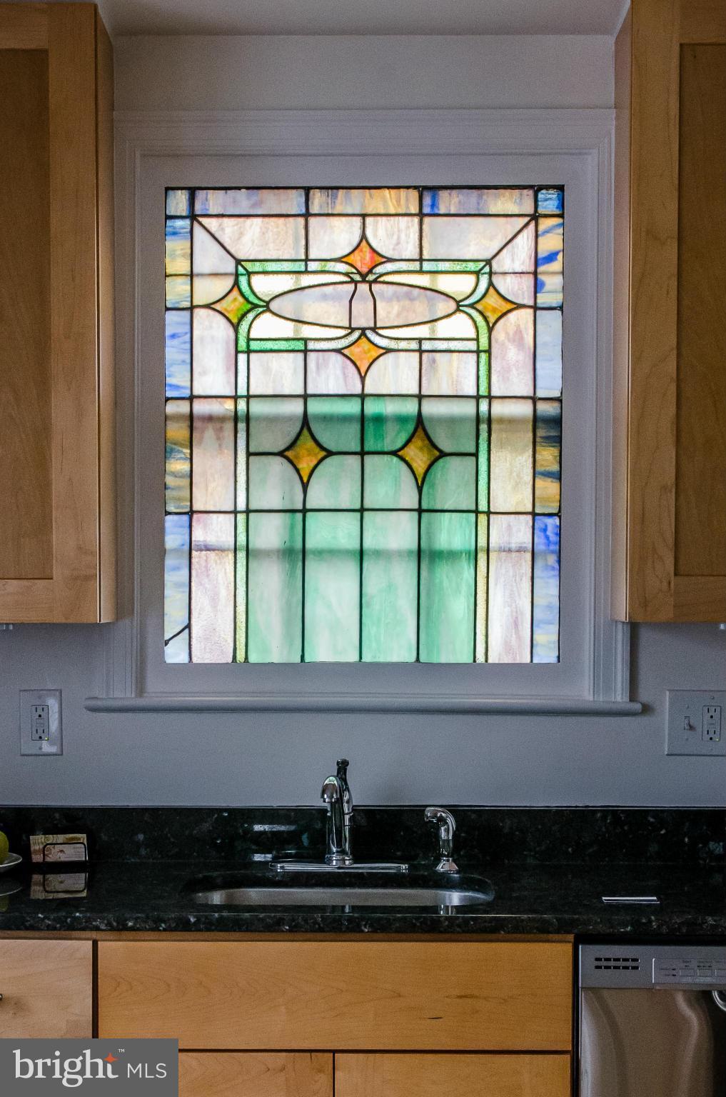 10435 Edgewood Avenue Silver Spring, MD 20901 - Photo 13 of 30 Stainglass insert