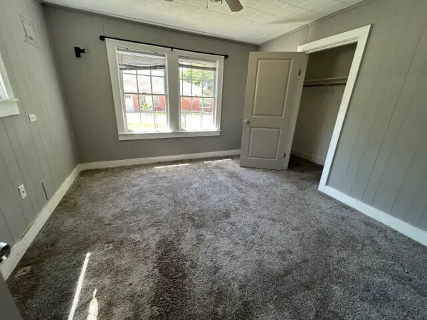 an empty room with windows