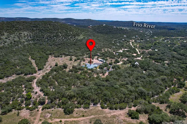 a view of city and green space