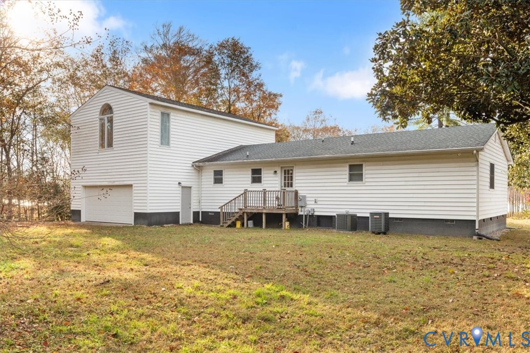 517 West Riverside Drive Lanexa, VA 23089 - Photo 24 of 27 a view of a house with a yard and sitting area