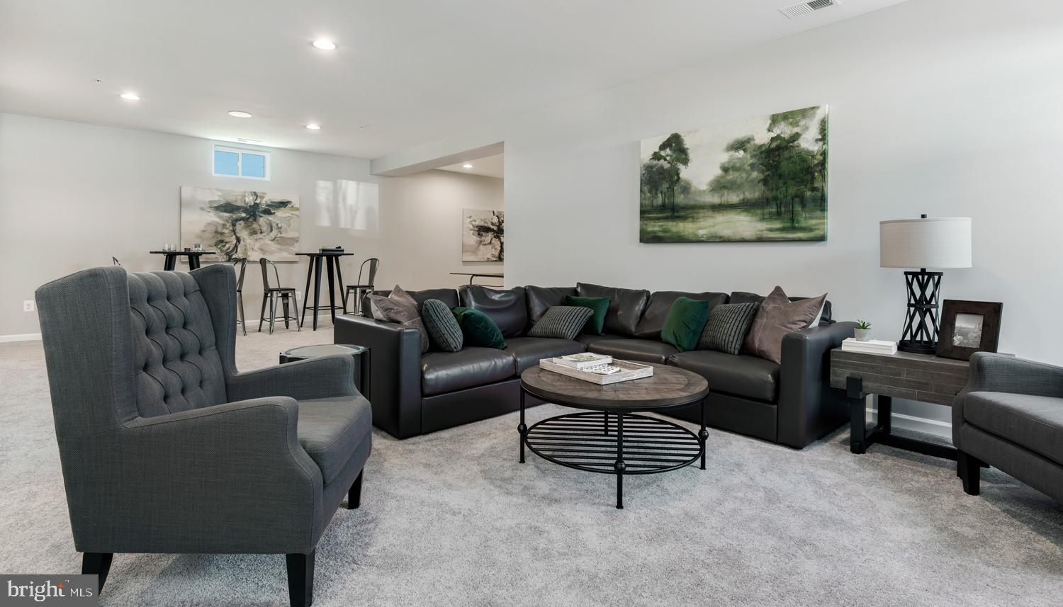 161 Silverleaf Drive Charles Town, WV 25414 - Photo 6 of 14 a living room with furniture and a wooden floor