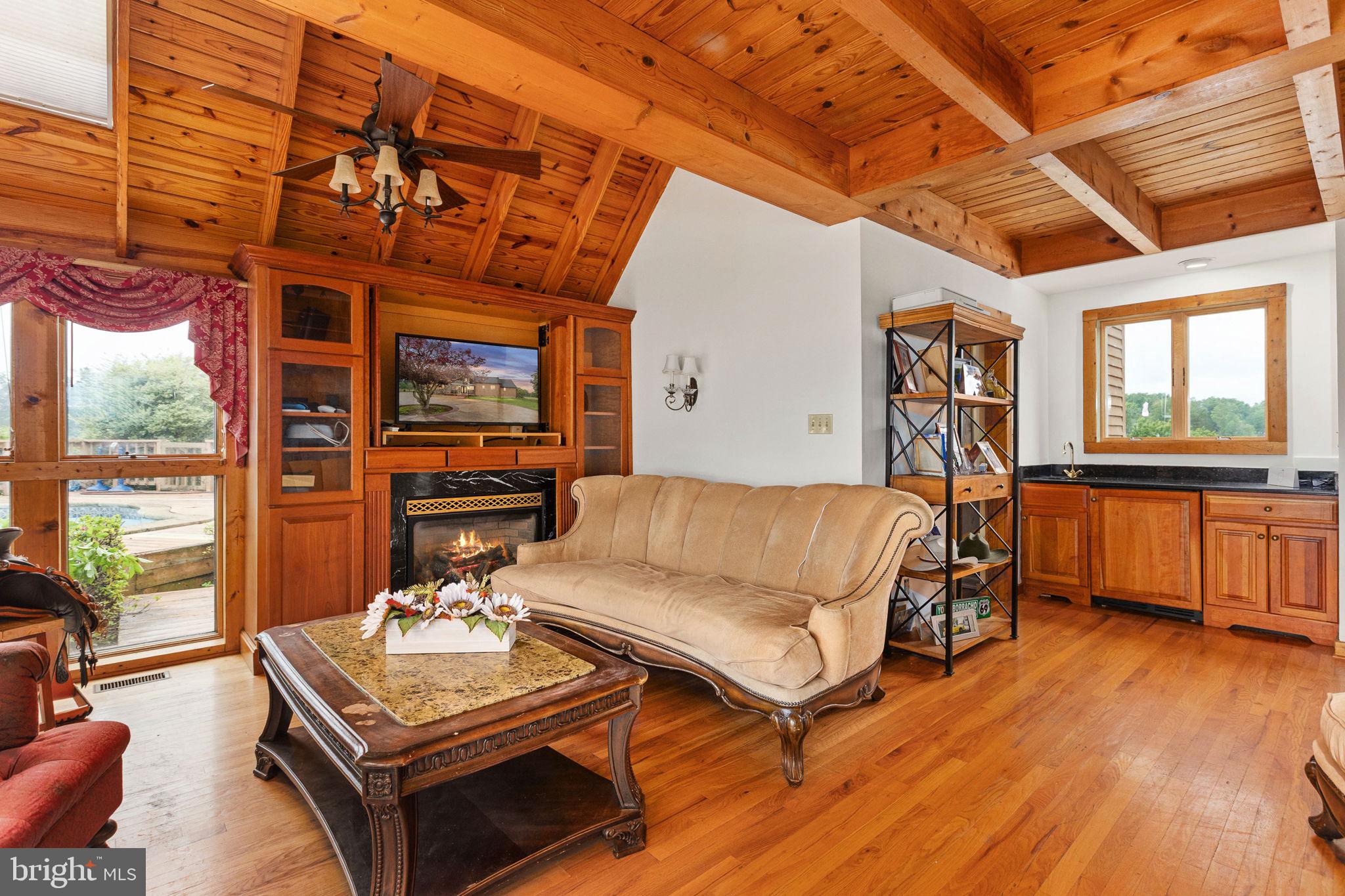 6119 Beach Road Midland, VA 22728 - Photo 12 of 98 a living room with furniture and a large window