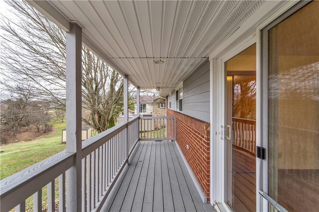 138 Sunset Lane Aliquippa, PA 15001 - Photo 12 of 31 a view of balcony with wooden floor
