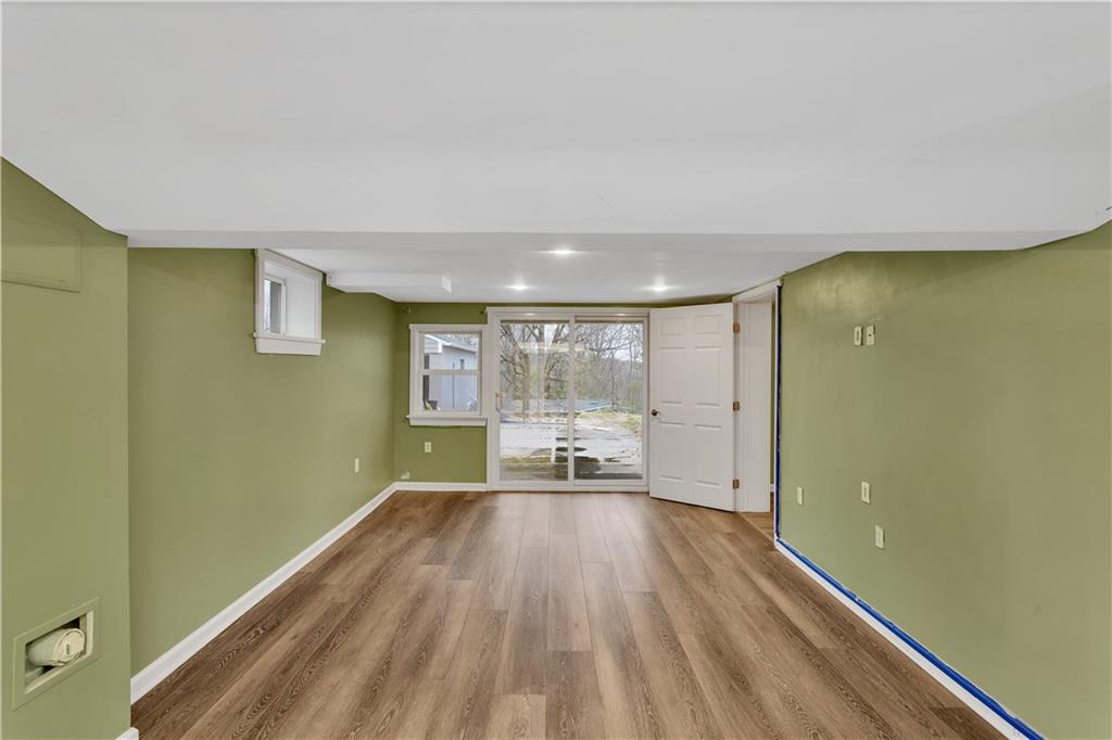 138 Sunset Lane Aliquippa, PA 15001 - Photo 19 of 31 a view of a room with wooden floor and a window