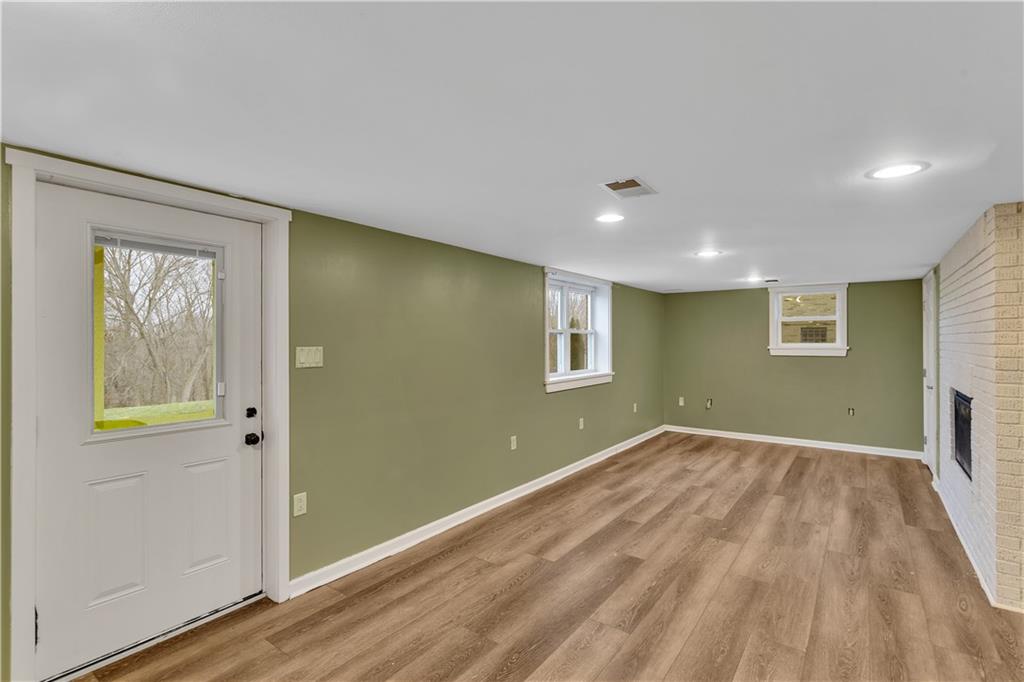 138 Sunset Lane Aliquippa, PA 15001 - Photo 25 of 31 wooden floor in an empty room with a window