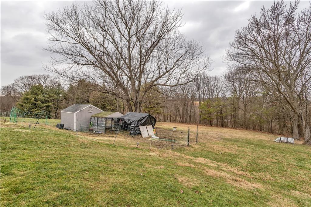 138 Sunset Lane Aliquippa, PA 15001 - Photo 28 of 31 a view of a house with pool and trees in the yard