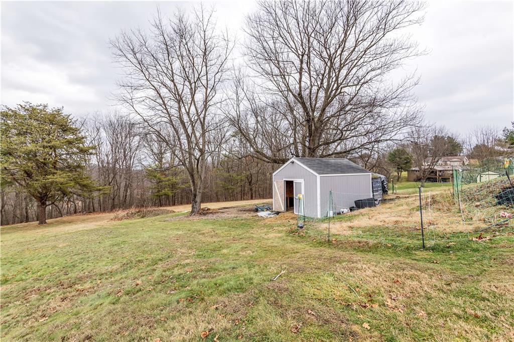 138 Sunset Lane Aliquippa, PA 15001 - Photo 29 of 31 a large house with a big yard and large trees
