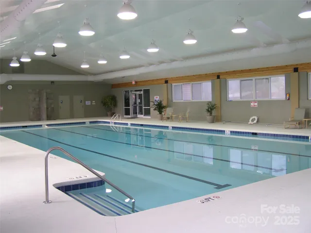 a bathroom with a sink and a large mirror