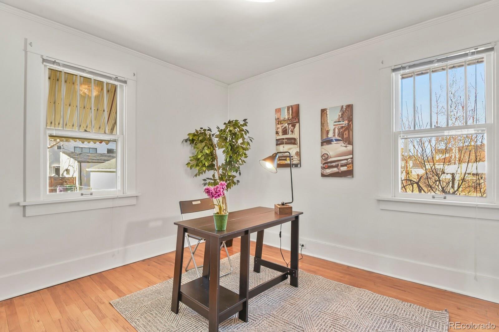 4537 Quitman Street Denver, CO 80212 - Photo 14 of 38 a dining room with furniture and window