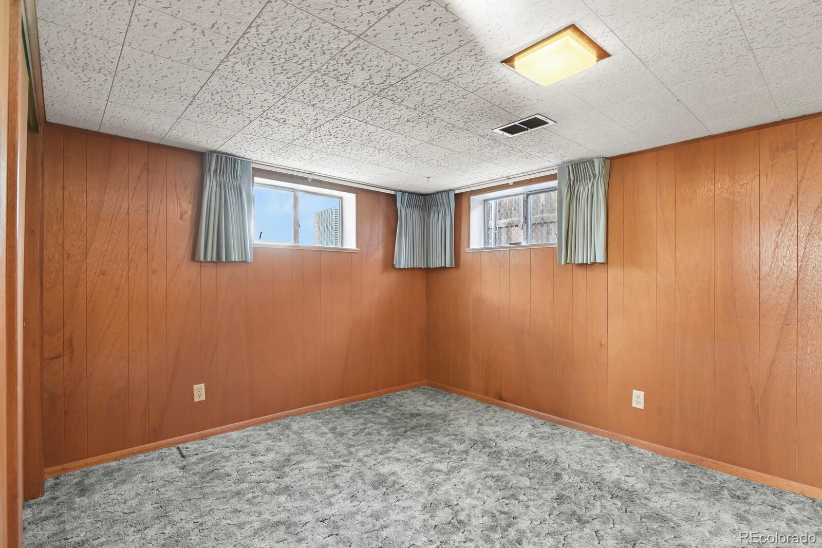 4537 Quitman Street Denver, CO 80212 - Photo 21 of 38 an empty room with windows