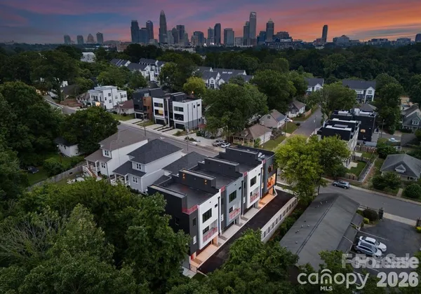 an aerial view of a house with a garden