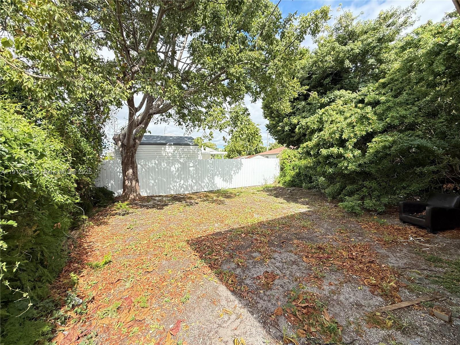 1865 Northwest 70th Street Miami, FL 33147 - Photo 9 of 9 a view of yard with large trees