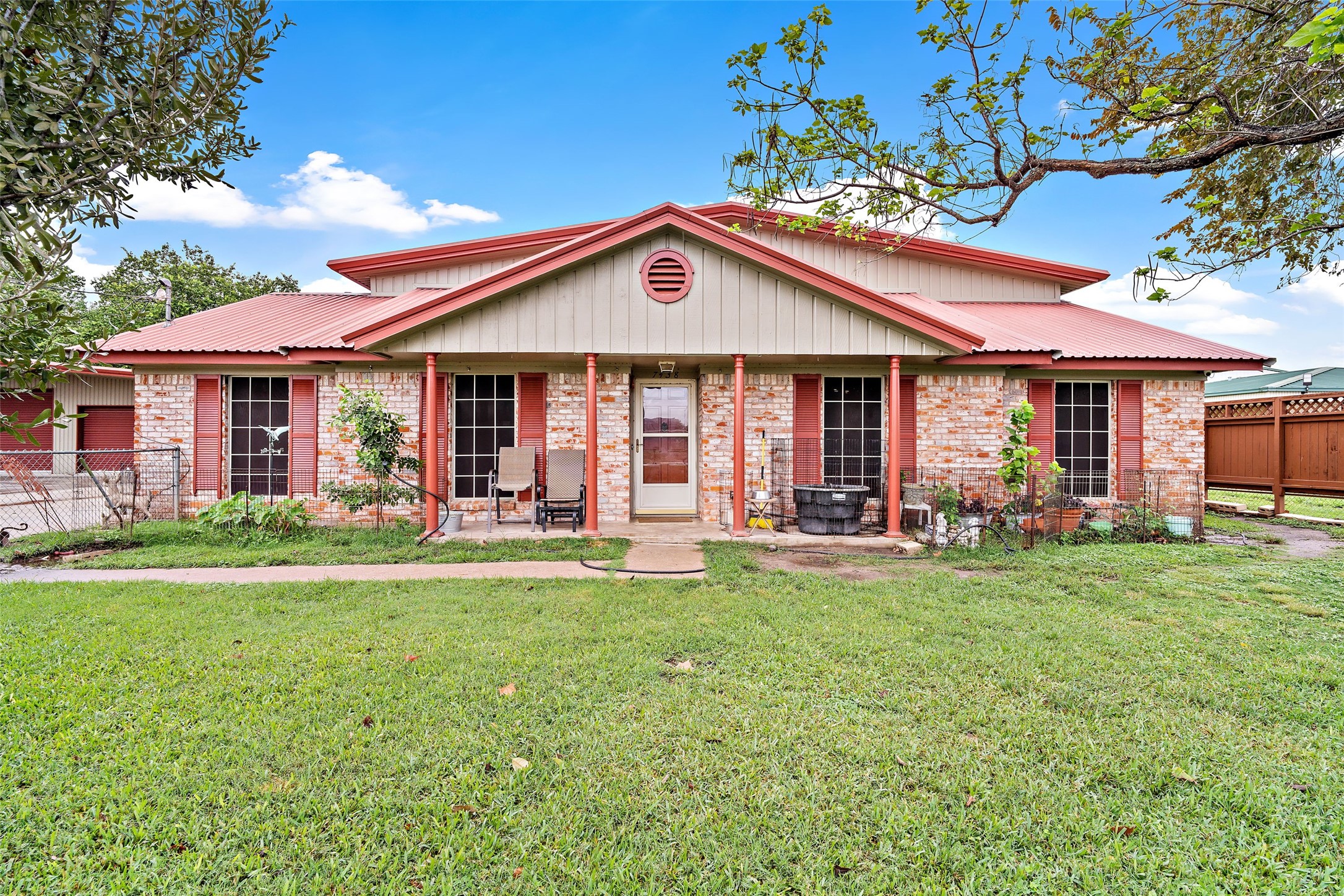 Welcome to 7438 Wright Road. This photo features the main home.