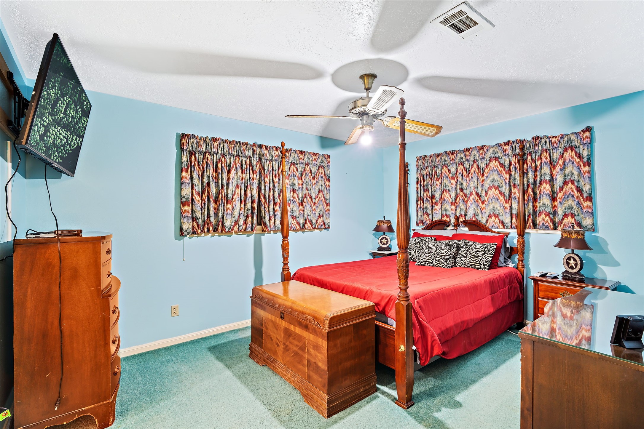 7438 Wright Road Houston, TX 77041 - Photo 16 of 50 The second primary bedroom with its own ensuite. There are 2 additional bedrooms.