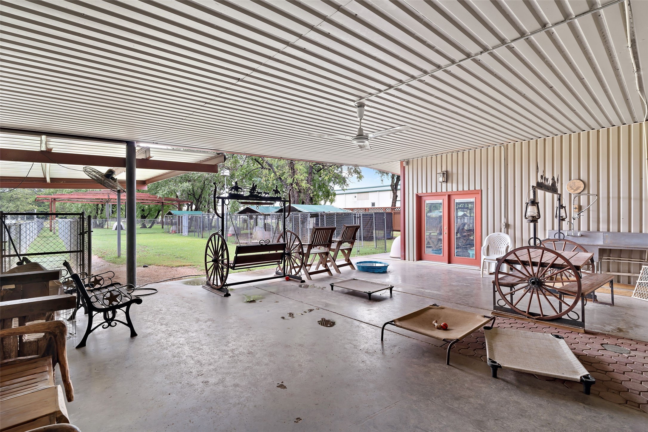 7438 Wright Road Houston, TX 77041 - Photo 17 of 50 The large covered patio off the great room overlooking the back of the property