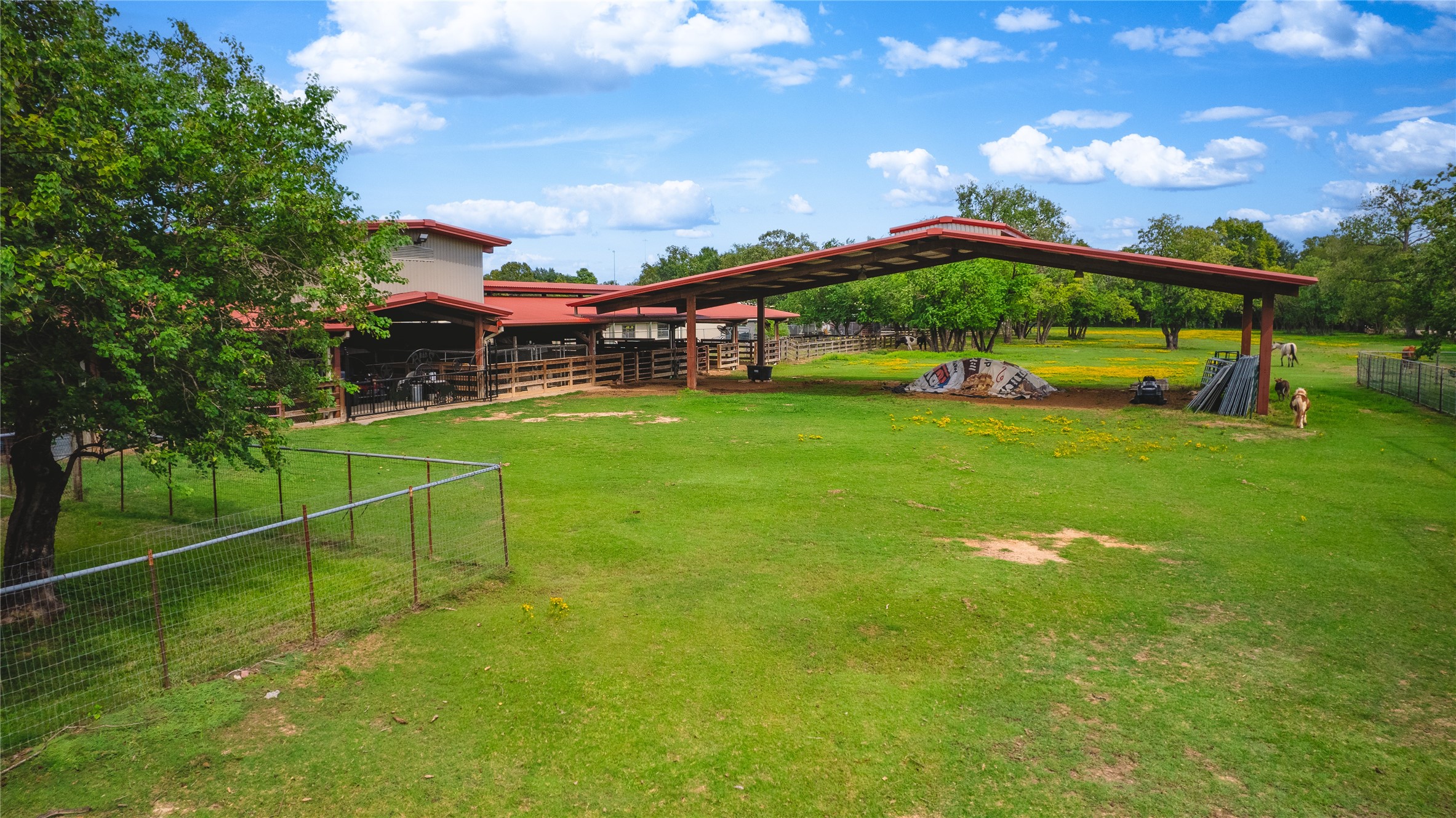 7438 Wright Road Houston, TX 77041 - Photo 33 of 50 The horse stable and the covered area outside of it.