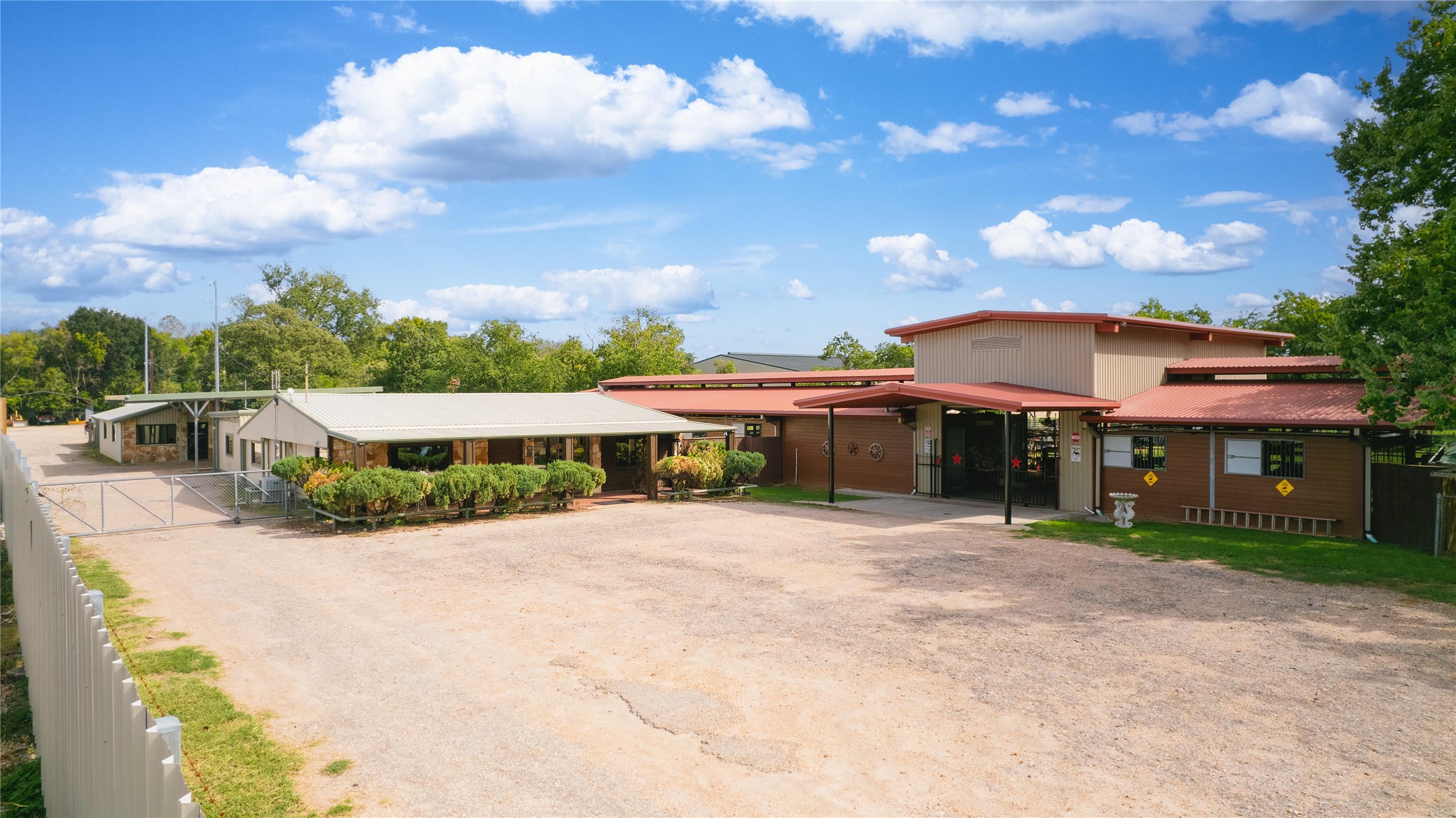 7438 Wright Road Houston, TX 77041 - Photo 37 of 50 As you enter the gate by the guest house you come to the office and horse stable.