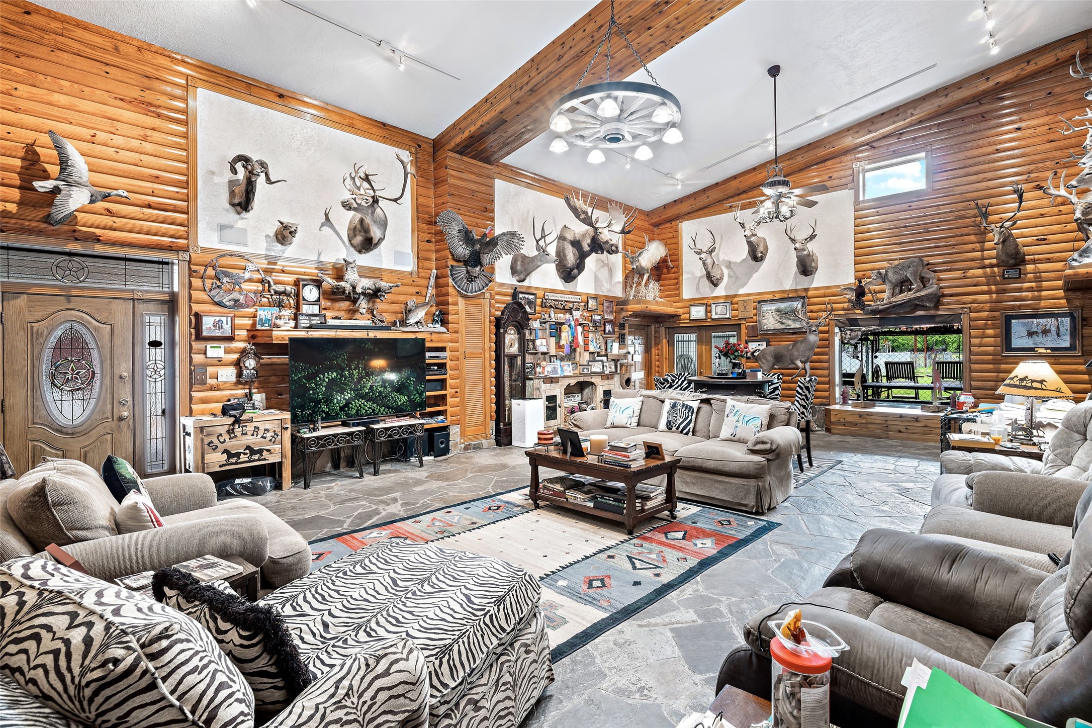 7438 Wright Road Houston, TX 77041 - Photo 4 of 50 The great room of the house with windows over looking the back of the property.