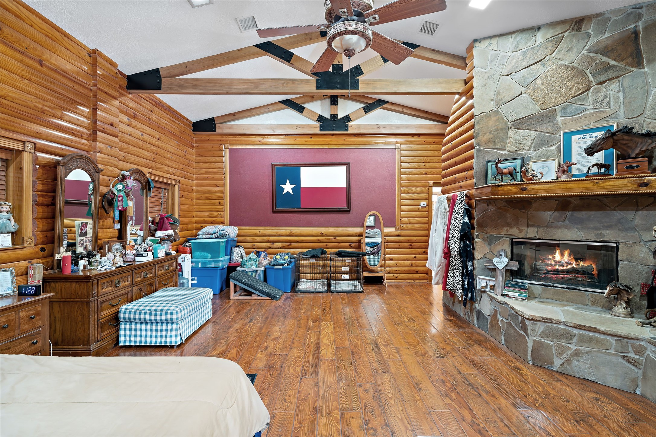 7438 Wright Road Houston, TX 77041 - Photo 10 of 50 The rock fire place in the primary bedroom.