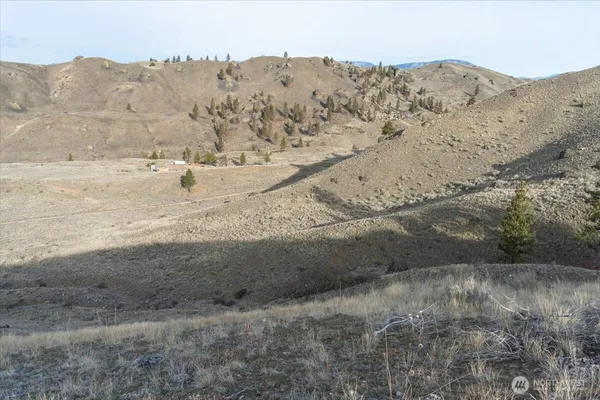 a view of mountain view with mountains in the background