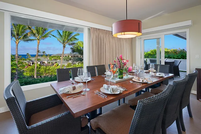 a view of a dining room with furniture window and outside view