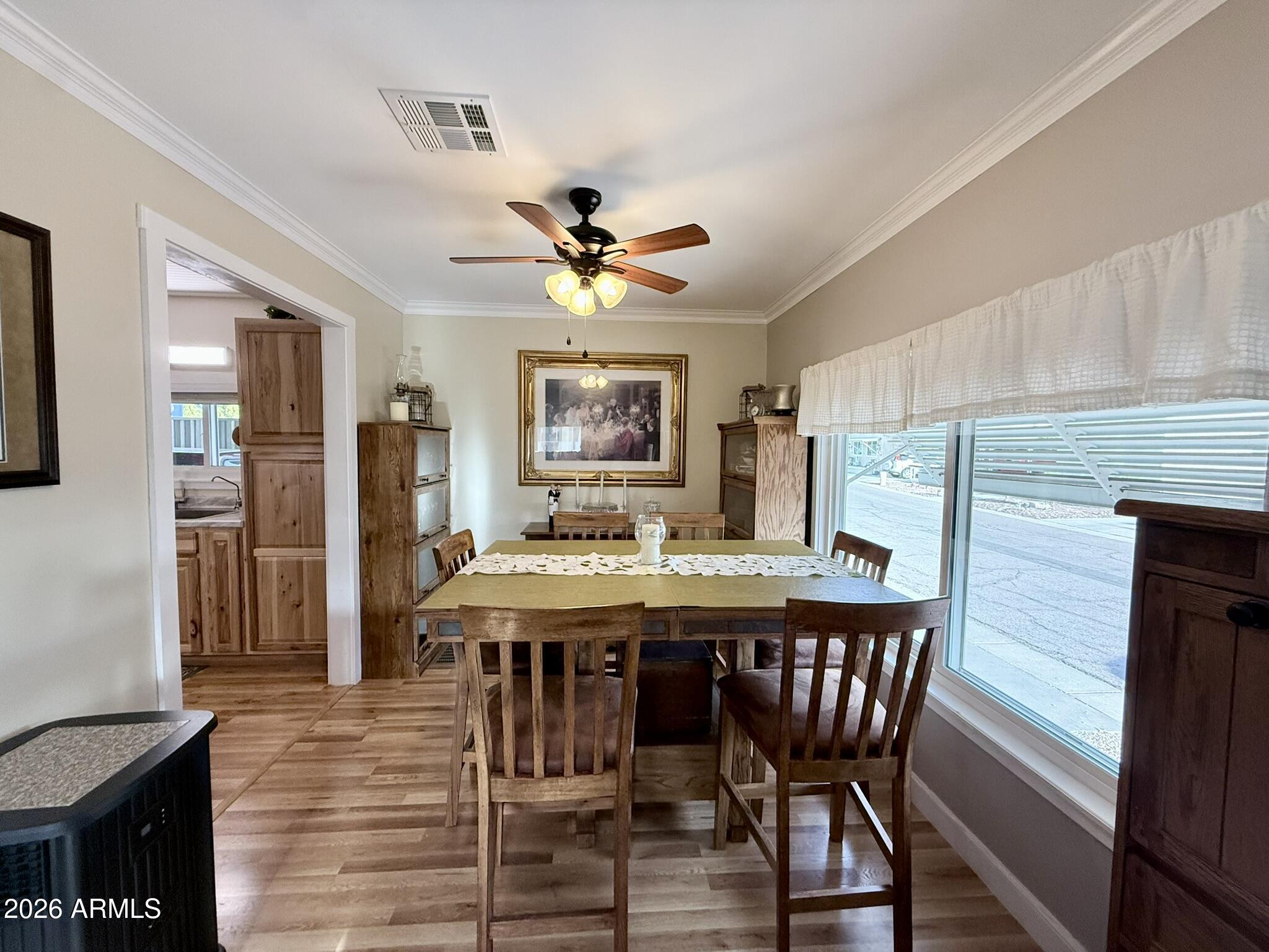 201 South Greenfield Road, Unit 246 Mesa, AZ 85206 - Photo 10 of 42 a view of a dining room with furniture