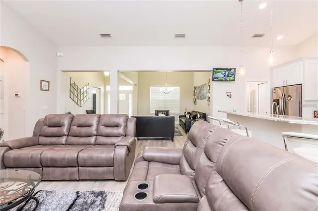 a living room with furniture and a couch