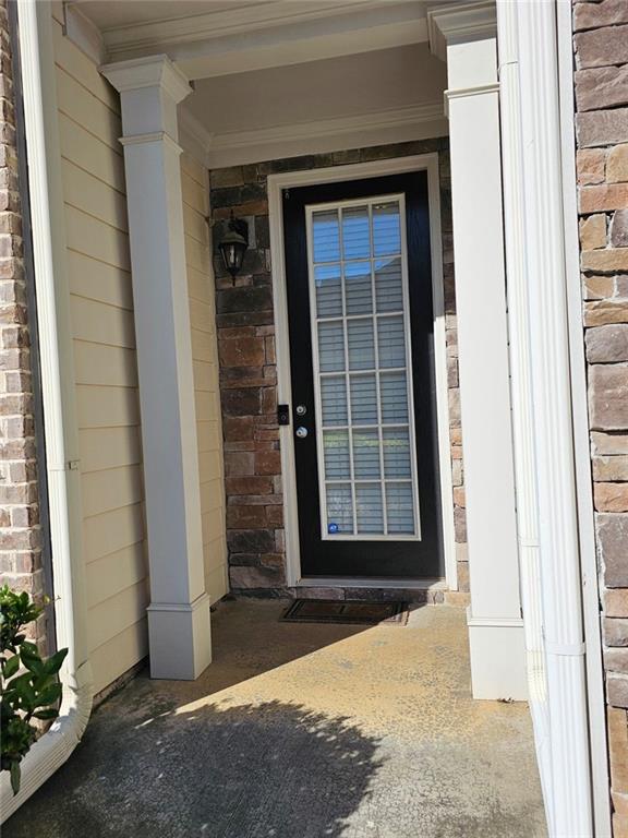 5747 Radford Loop Fairburn, GA 30213 - Photo 4 of 36 a view of front door of a house