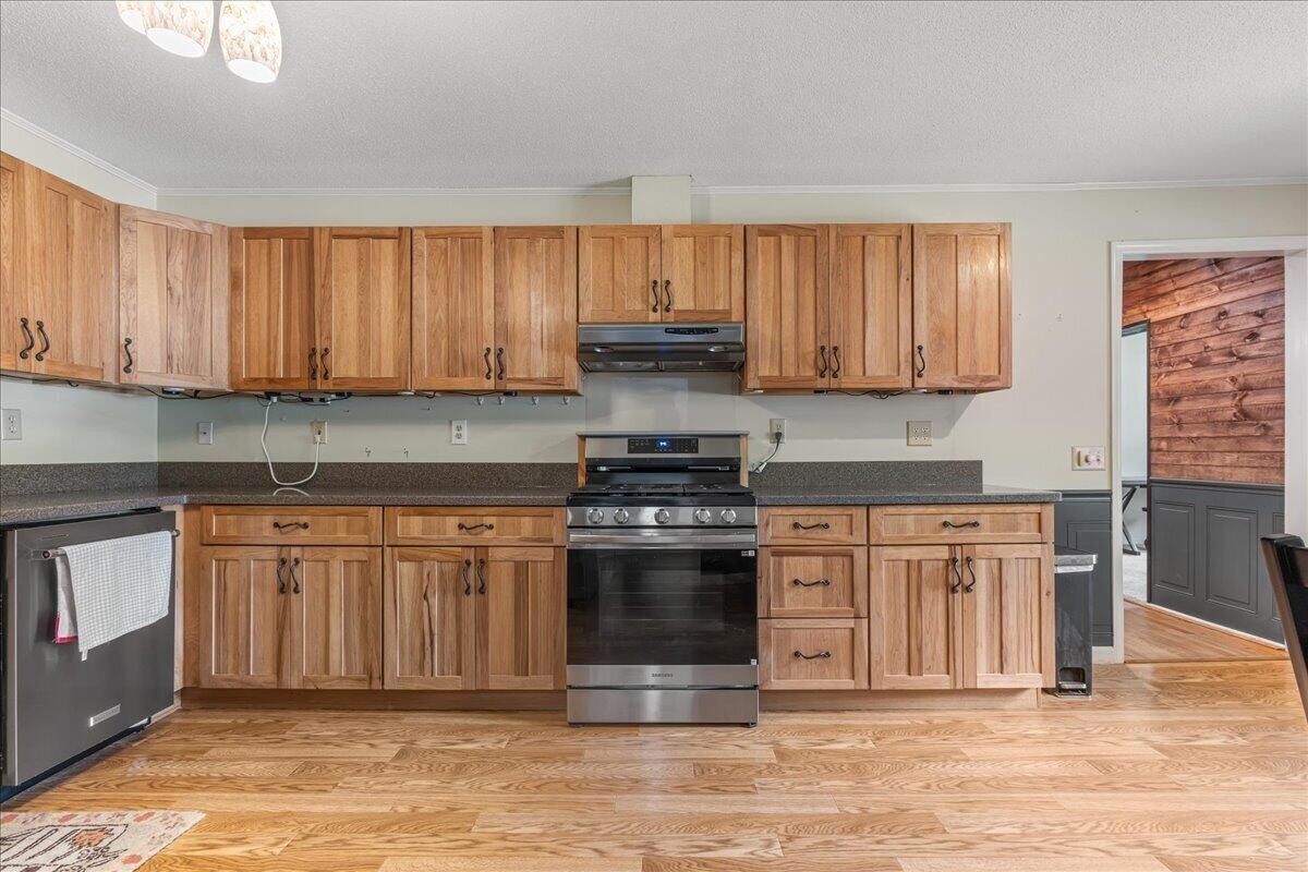 2522 Cindy Street Athens, TN 37303 - Photo 11 of 36 a kitchen with stainless steel appliances granite countertop a stove a sink and a granite counter tops