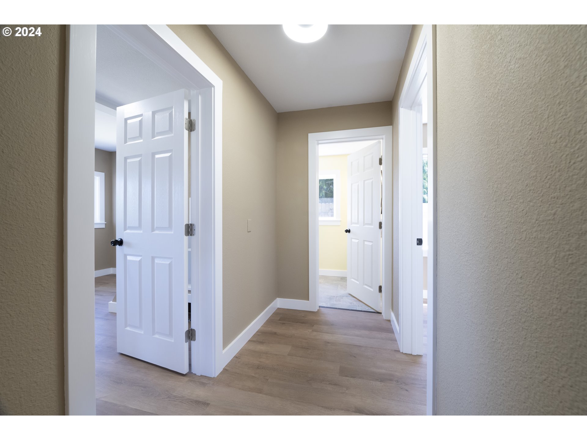 48450 Southwest Hebo Road Grand Ronde, OR 97347 - Photo 24 of 32 a view of a hallway with wooden floor
